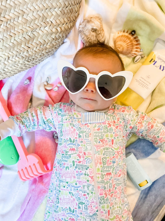 joy street palm beach baby zip onesie on baby with heart sunglasses