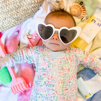 joy street palm beach baby zip onesie on baby with heart sunglasses
