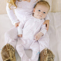 Joy Street Houston Pink on model Baby Zip Onesie and Two Piece Pajama