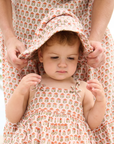 Pink Chicken Baby Girls Sun Hat in Pink Prairie Block Print