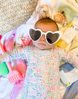 joy street palm beach baby zip onesie on baby with heart sunglasses