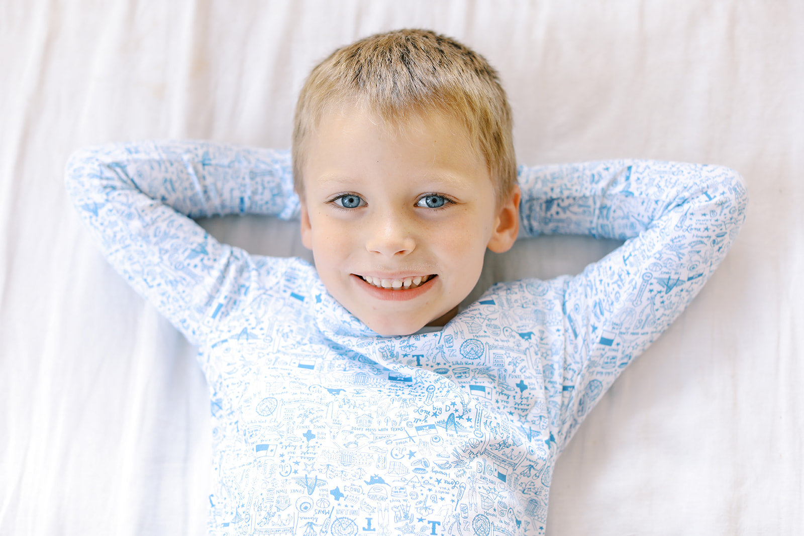 close up shot of boy in Dallas Fort-Worth pajamas