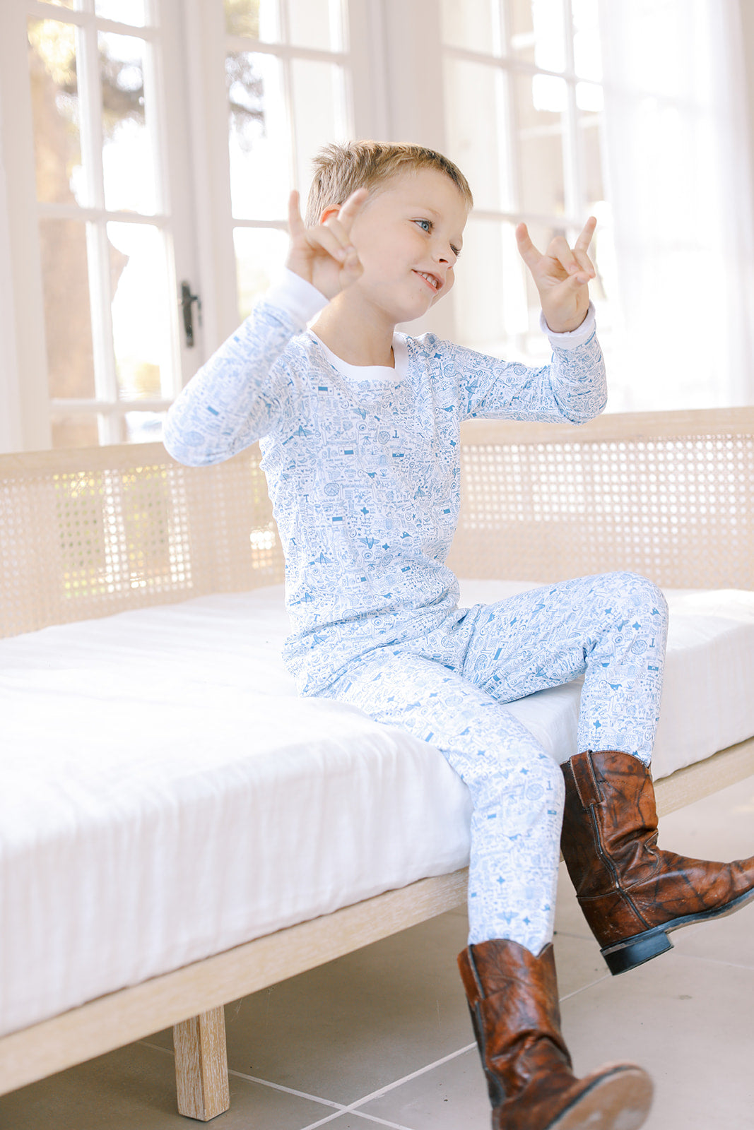 Boy in Dallas Fort-Worth Pajamas &amp; cowboy boots